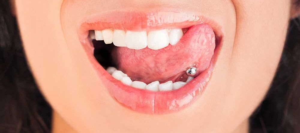Understanding the Risks and The Impact of Oral Piercing on Oral Health