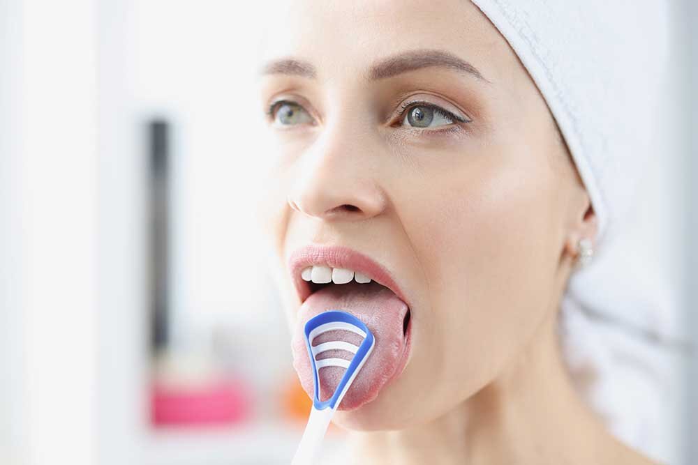 Why Do Dentists Recommend People Brush And Clean Their Tongues